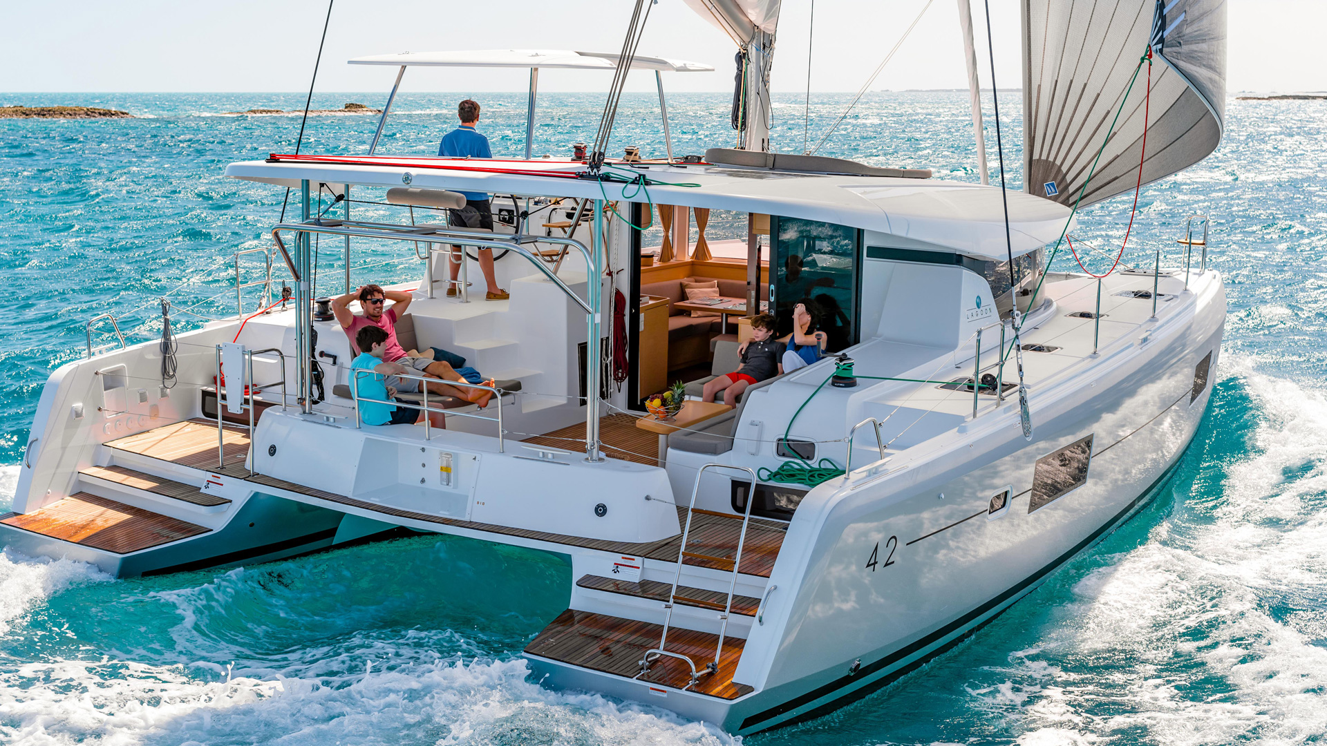 catamaran with sails up