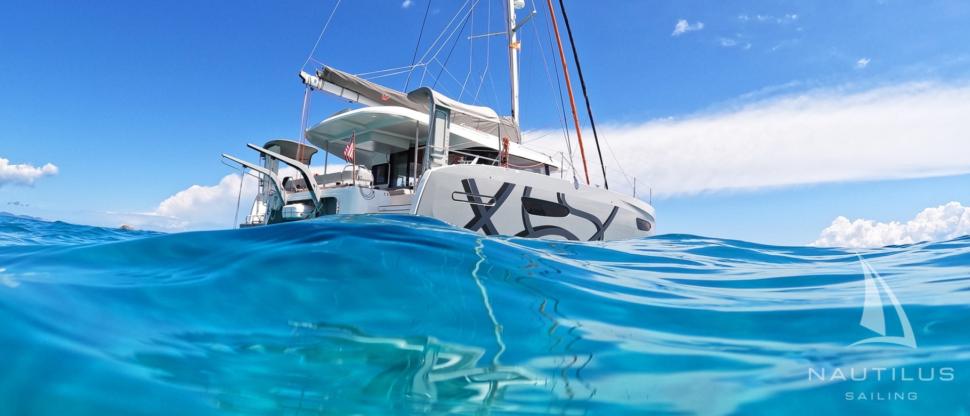 small catamaran with outboard